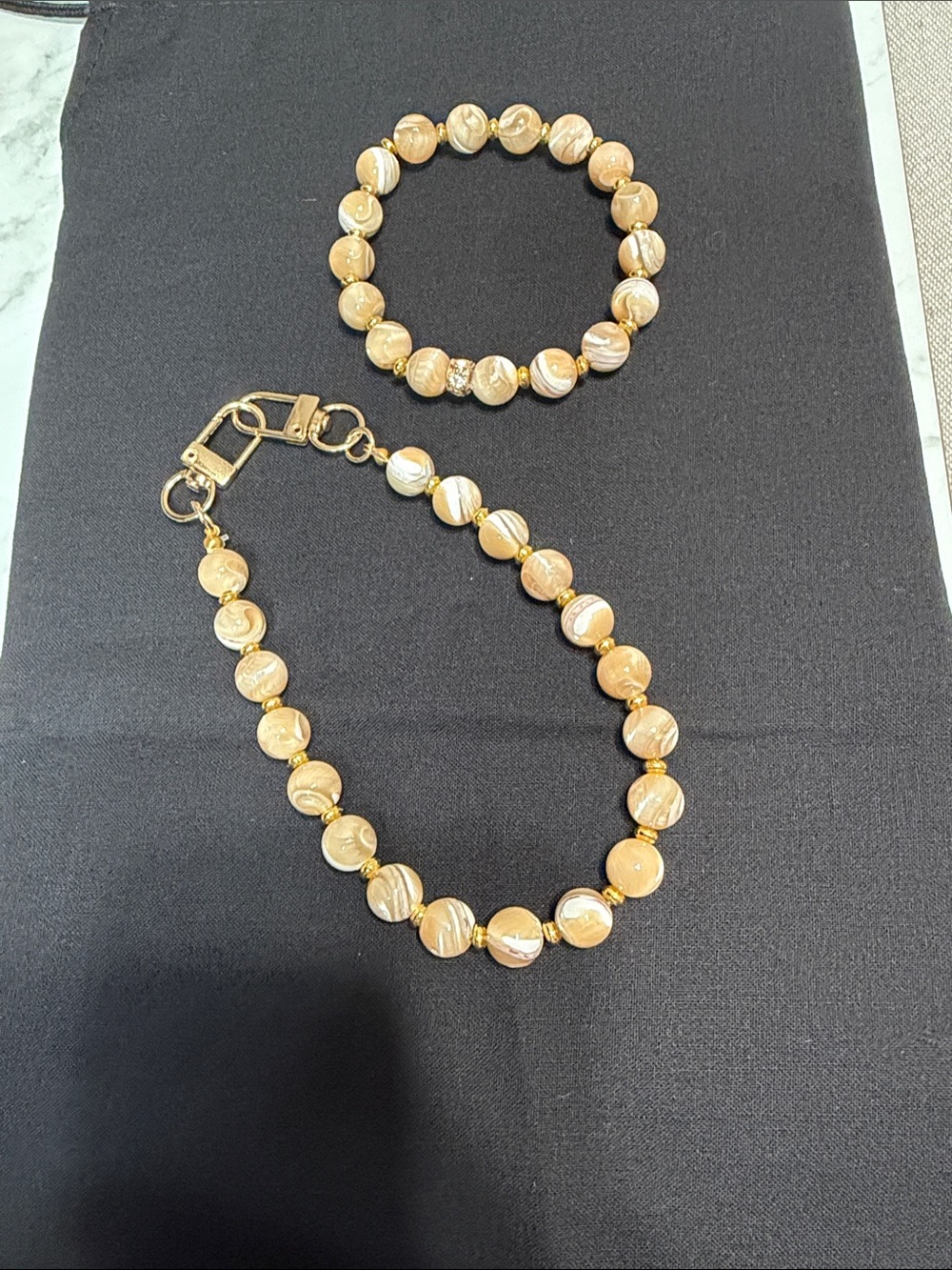 Gold-Tone Swirled Bead phone/bag Strap and Bracelet Set
